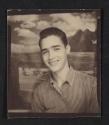 [Photo booth portrait of a young man]