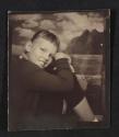 [Photo booth portrait of a boy]