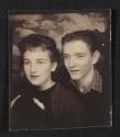 [Photo booth portrait of two young men]