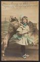 [Dog and girl with umbrella]