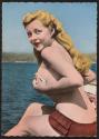 [Topless woman]