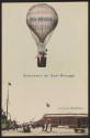 [Balloon floating above city]