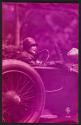 [Woman in car]