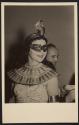 [Masked woman]