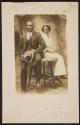 [Seated couple]
