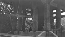 Men looking at huge press or counterweight, Japan Trip