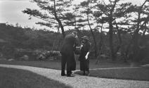 Three people standing in garden, Japan Trip
