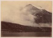 Kunak Mountain Partially Enveloped in a Fog