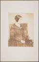 [Seated woman]