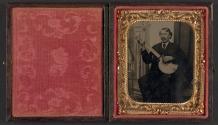 [Man with banjo]