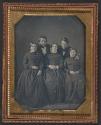 [Group portrait of three women and two men]