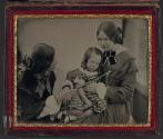 [Two women with child]