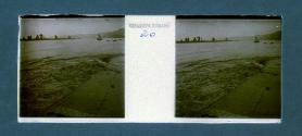 [Water washing over pier]