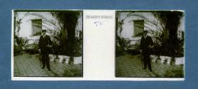 [Man with cane in front of plants]