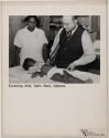 Examining child, Gee's Bend, Alabama