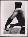 [Man with Rope]