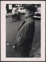 [Man with Hat]