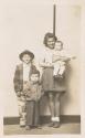 [Family group of four children]
