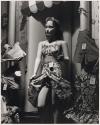 [Mannequin wearing tropical outfit with floral patterns]