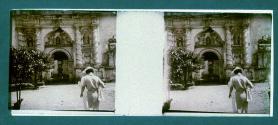 [Two women walking towards cathedral]