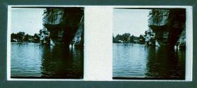[Water, cliffs and house]
