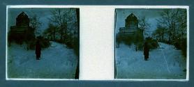 [Unid. woman in snowy landscape with building in backround]