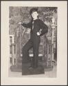 [Sailor posed on steps]