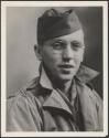 [Young soldier with open collar]