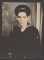 [Sailor in Navy uniform, US Navy flat hat]