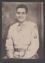 [US Army Technical Sargeant, seated]