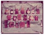 [Eighteen bottles of liquor]