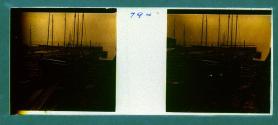 [Men working on boat in shipyard]