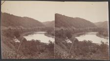 [White house on a bend in a river]