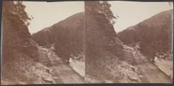 [Dirt road along a river]