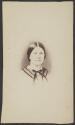 [Woman wearing necktie]