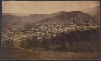 [Town among hills]
