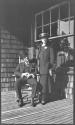 George and Isabel Bonbright on porch, Oak Lodge Trip