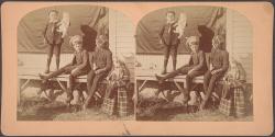 [Group of children with cat]