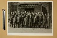 George Eastman and group in front of Harrow Building