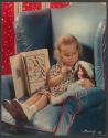 [Little girl talking to her doll]