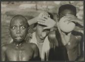 At a stream in Leopoldville, Belgian Congo, we encounter a group of children bathing. They begged us to take a picture, and this is one result.