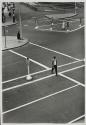 [People crossing street intersections]