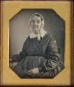 [Woman wearing a bonnet]