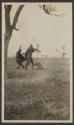 Killing hyena with knives after wounded by George Eastman, African Safari