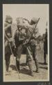 George Eastman's gunbearer "Saasita" with African tribesmen, African Safari