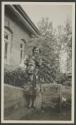 Osa Johnson with pet cat "Fifi"  - front steps, Parklands, African Safari