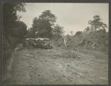 Automobiles stuck in mud, African Safari