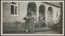 Dan Pomeroy and Osa Johnson in front of house, Parklands, African Safari