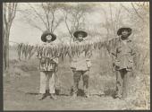 Osa Johnson and companions posing with caught fish, African Safari