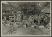 George Eastman near luggage and automobiles, African Safari